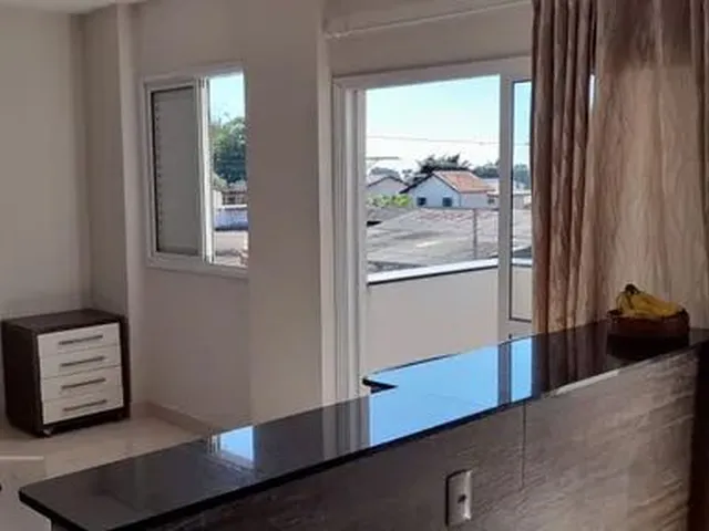 Imagem: O apartamento possui 2 Dormitórios, 1 Suíte, 2 Banheiros,