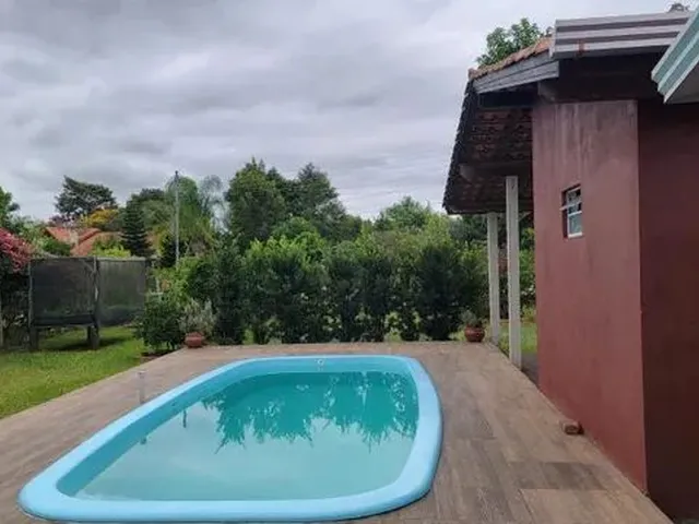 Imagem 2: Velleda Oferece Belo Sítio com Chalé, Piscina e Frutíferas, em Condomínio Fechado Na