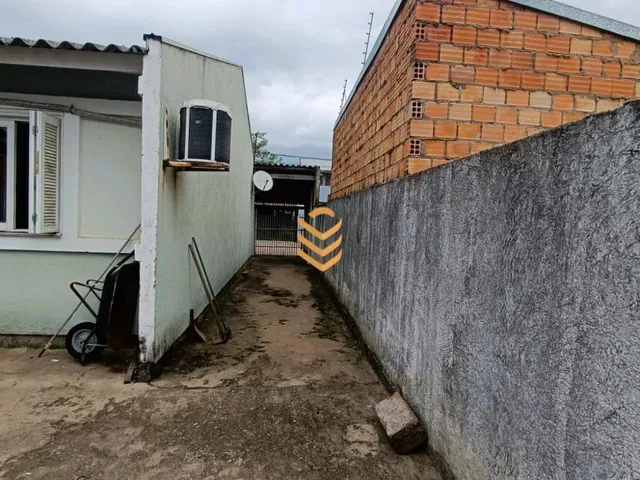 Imagem 6: Imóvel à venda em Canoas: Casa com banheiro social, sala de estar e cozinha no Parque