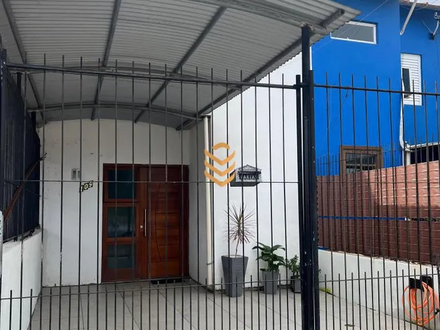 Imagem 5: Sobrado à venda em Nova Santa Rita com sala de jantar, cozinha e móveis planejados