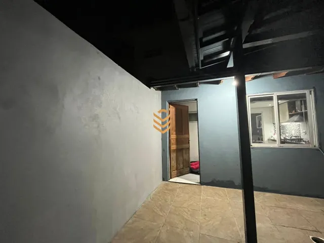 Imagem 3: Sobrado à venda em Nova Santa Rita com sala de jantar, cozinha e móveis planejados