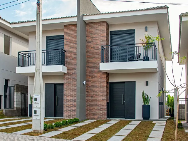 Imagem: A casa em condomínio possui 2 Dormitórios, 2 Suítes, 3