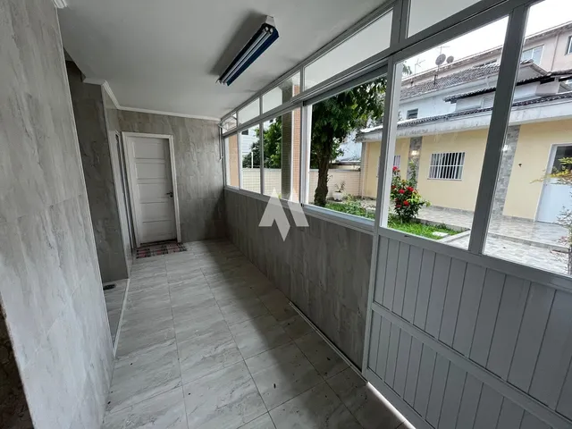 Imagem 12: Sobrado para locação com edícula e garagem ampla no Embaré em Santos - SP