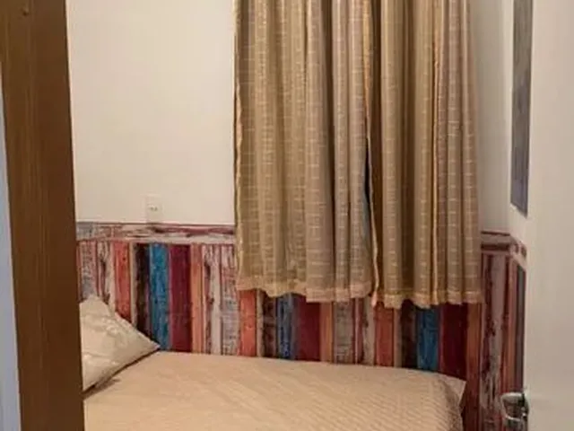 Imagem 3: Quarto Pequeno e Confortável