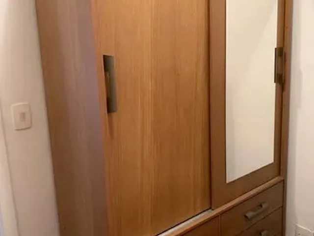 Imagem 2: Quarto Pequeno e Confortável