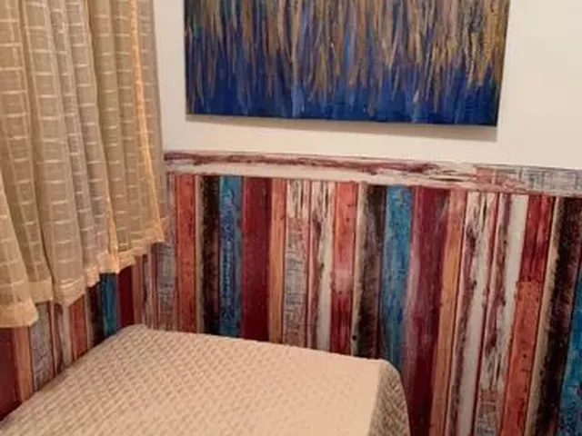 Imagem 4: Quarto Pequeno e Confortável
