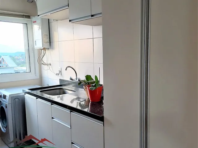 Imagem 7: Excelente apartamento mobiliado de 3 dormitórios sendo 01 suíte. Situado no terceiro