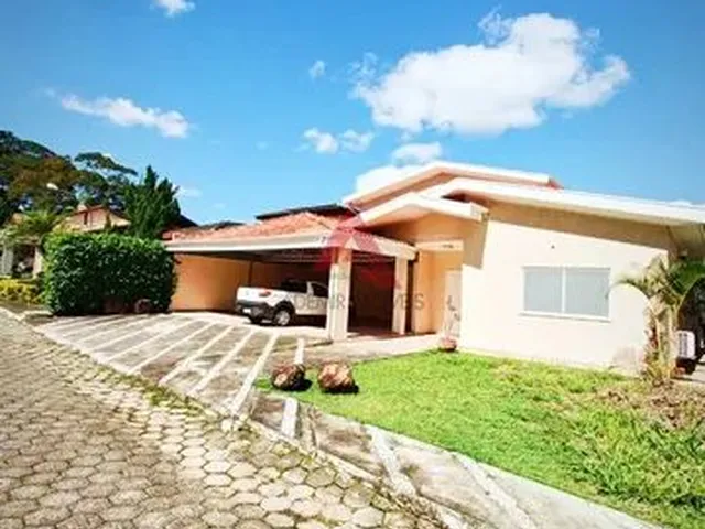 Imagem: A casa em condomínio possui 4 Dormitórios, 3 Suítes, 3