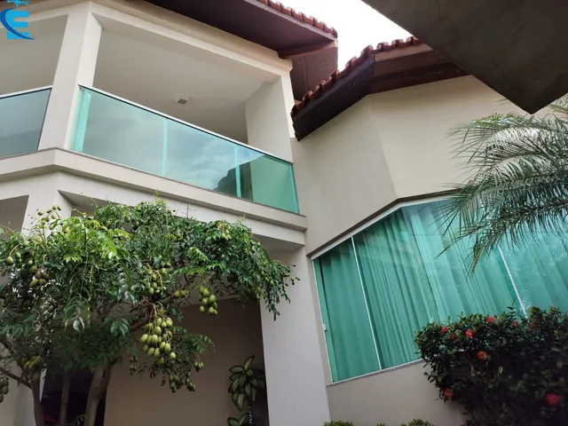 Imagem 2: Casa em 2 pavimentos, com 3 suítes, piscina, área gourmet, sala em 3 ambientes e 3