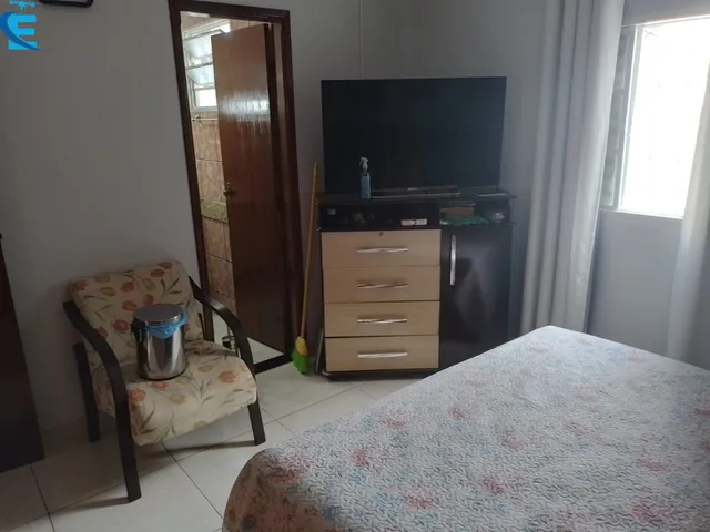 Imagem 8: Excelente Casa com 3/4 Sendo 1 Suíte, 2 Salas, Área Gourmet Completa, Piscina e 4 Vagas de Garagem