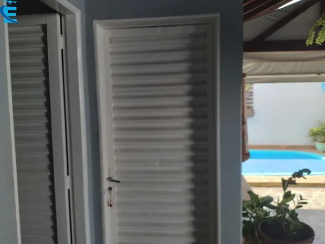 Imagem 4: Excelente Casa com 3/4 Sendo 1 Suíte, 2 Salas, Área Gourmet Completa, Piscina e 4 Vagas de Garagem