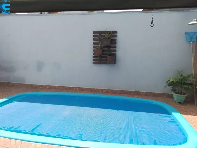 Imagem 13: Excelente Casa com 3/4 Sendo 1 Suíte, 2 Salas, Área Gourmet Completa, Piscina e 4 Vagas de Garagem
