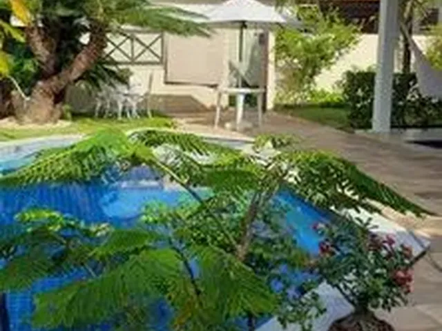 Imagem: Casa de Praia com Jardim e Piscina