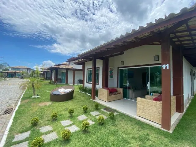Imagem: A casa em condomínio possui 4 Dormitórios, 4 Suítes, 4