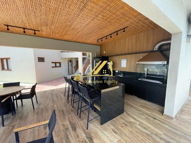 Imagem 10: Oahu Imbassaí, Apartamento 2 suítes, lavabo, varanda com deck descoberto, sala, cozinha