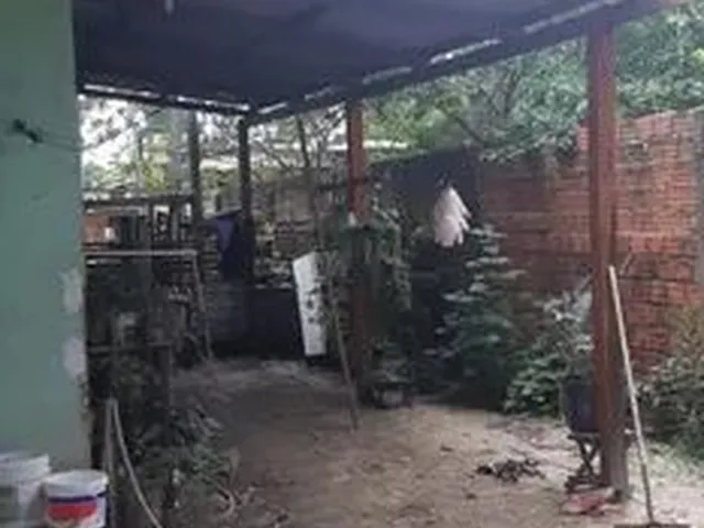 Imagem: A casa possui 2 Dormitórios, 1 Banheiro, 2 Vagas na
