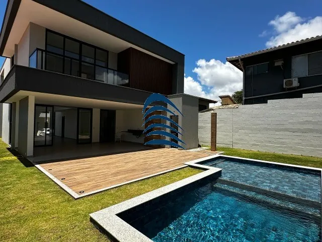 Imagem: A casa possui 4 Dormitórios, 4 Suítes, 5 Banheiros, 3 Vagas