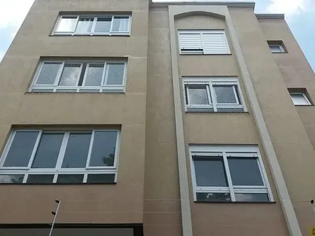 Imagem: O apartamento possui 2 Dormitórios, 1 Suíte, 2 Banheiros,