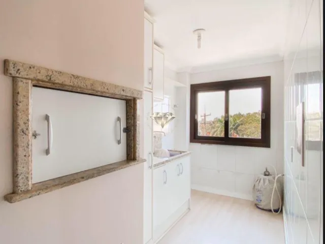 Imagem 3: Apartamento à venda em Torres, Centro - Churrasqueira e Piso Laminado