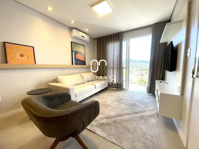 Imagem: O apartamento possui 2 Dormitórios, 1 Suíte, 2 Banheiros,