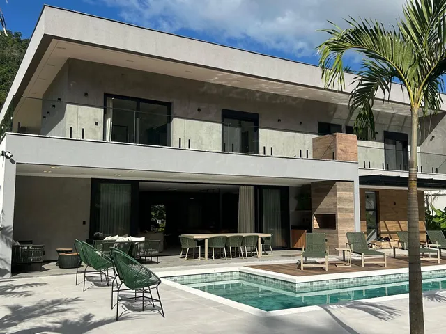 Imagem: A casa possui 5 Dormitórios, 4 Suítes, 6 Banheiros, 4