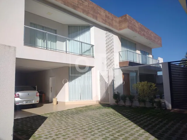 Imagem: A casa em condomínio possui 4 Dormitórios, 4 Suítes, 4