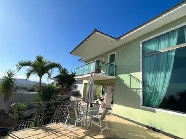 Imagem: A casa em condomínio possui 4 Dormitórios, 3 Suítes, 5