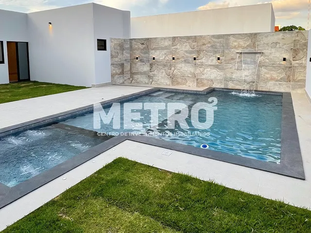 Imagem: A casa em condomínio possui 4 Dormitórios, 4 Suítes, 4