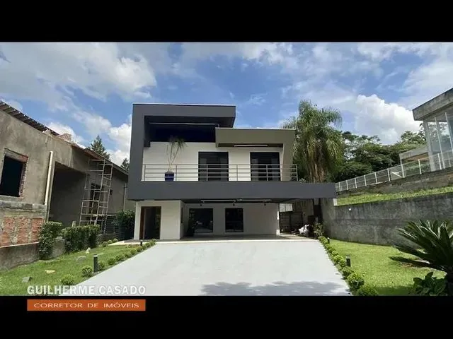Imagem: A casa possui 4 Dormitórios, 4 Suítes, 5 Banheiros, 5