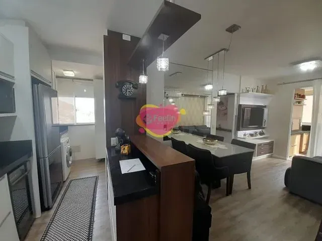 Imagem: O apartamento possui 2 Dormitórios, 1 Suíte, 2 Banheiros,