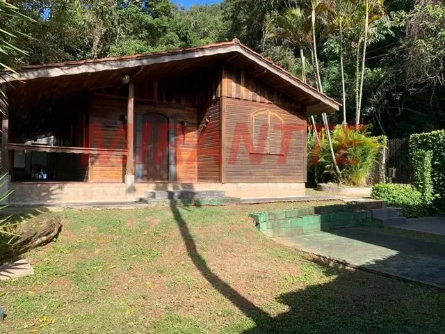 Imagem: Casa Térrea com Lareira Dentro do Alpes
