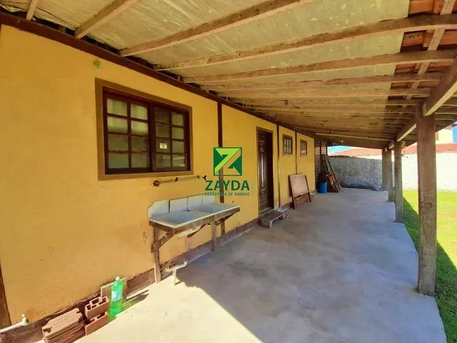 Imagem 4: Casa linear com 600m² de terreno, 03 quartos e amplo jardim gramado, no Bairro Peixe