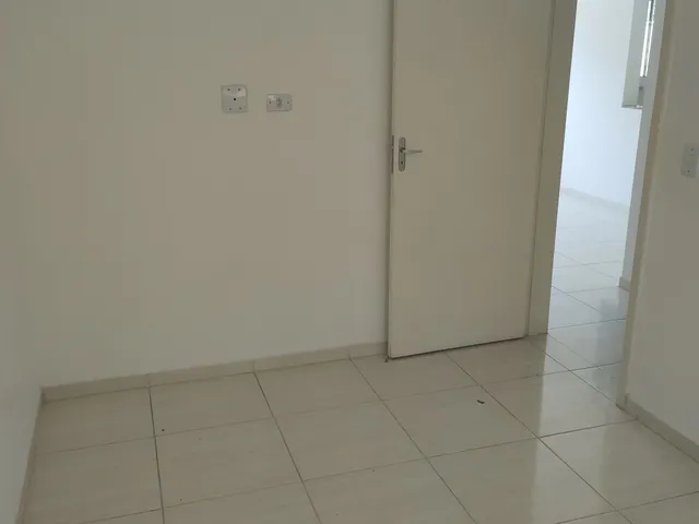Imagem: O apartamento possui 2 Dormitórios, 1 Banheiro, 1 Vaga na