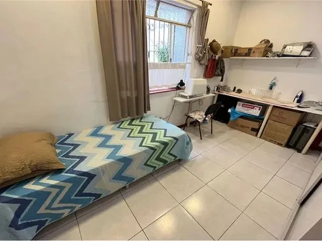 Imagem 9: Apartamento Térreo de 2 Quartos com Sala, Cozinha e Banheiro, com Área Externa Pequena