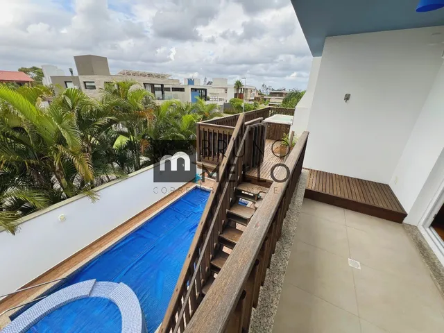 Imagem 7: Casa ampla com 4 dormitórios em condomínio fechado, com acesso a praia do Morro das