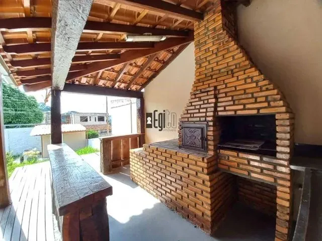 Imagem 5: Casa Linear e Totalmente Individual À Venda com Quintal Enorme e Varanda Gourmet !!