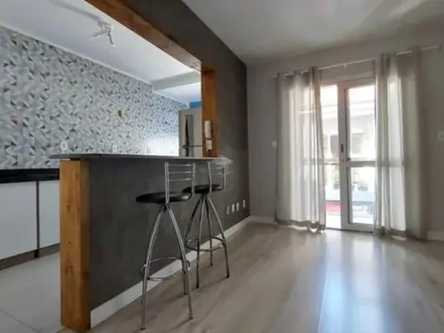 Imagem: O apartamento possui 2 Dormitórios, 1 Banheiro, 1 Vaga na