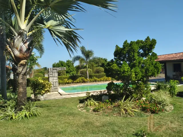 Imagem 4: Uma Chácara com aproximadamente 7200 m2 toda murada piscina deck com uma confortável