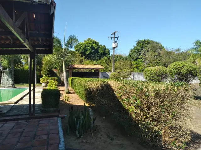 Imagem 2: Uma Chácara com aproximadamente 7200 m2 toda murada piscina deck com uma confortável