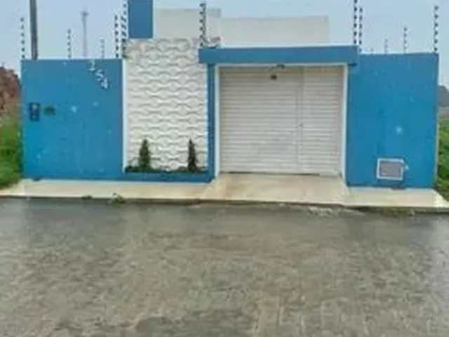 Imagem: A casa possui 2 Dormitórios, 1 Suíte, 2 Banheiros, 2