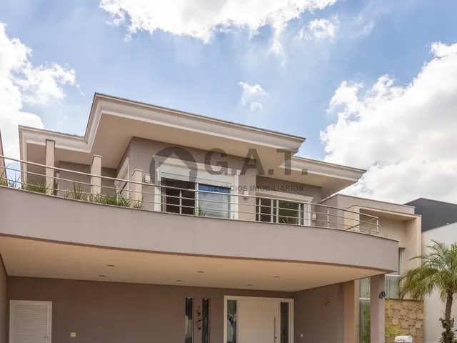 Imagem: A casa em condomínio possui 3 Dormitórios, 4 Suítes, 3