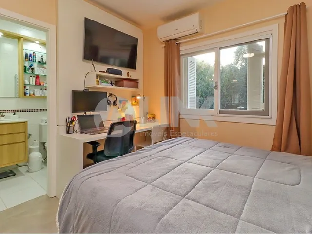Imagem 4: Casa em Condomínio de Luxo com 3 Quartos e 2 Vagas de Garagem no Bairro Nonoai, Porto