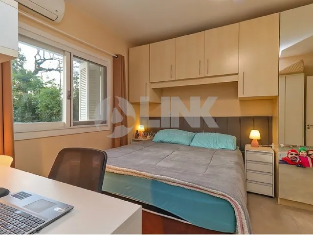 Imagem 7: Casa em Condomínio de Luxo com 3 Quartos e 2 Vagas de Garagem no Bairro Nonoai, Porto