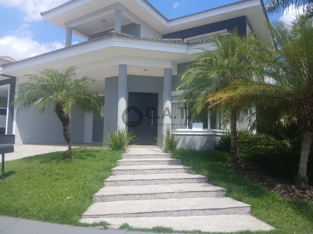 Imagem: A casa em condomínio possui 4 Dormitórios, 3 Suítes, 6