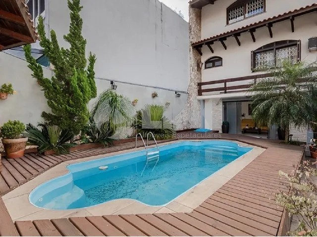 Imagem 2: Imóvel Exclusivo: Casa de 3 Quartos com 3 Suítes e 8 Vagas no Partenon, Porto Alegre-RS!