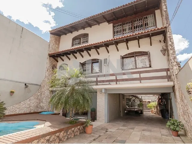 Imagem 3: Imóvel Exclusivo: Casa de 3 Quartos com 3 Suítes e 8 Vagas no Partenon, Porto Alegre-RS!