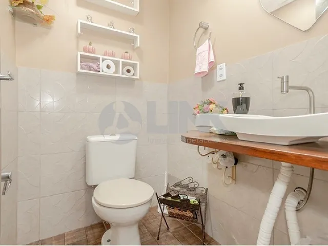 Imagem 10: Imóvel Exclusivo: Casa de 3 Quartos com 3 Suítes e 8 Vagas no Partenon, Porto Alegre-RS!