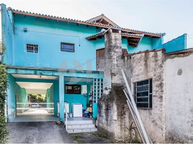Imagem 3: Casa com 3 quartos 3 suítes e 4 vagas de garagem à venda no bairro Partenon em Porto
