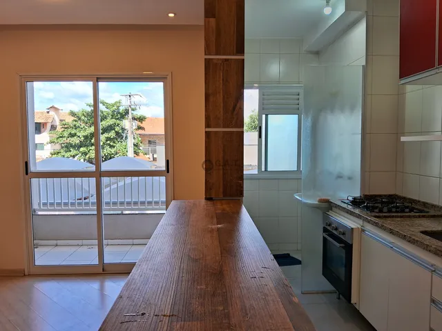 Imagem: O apartamento possui 2 Dormitórios, 1 Banheiro, 2 Vagas na