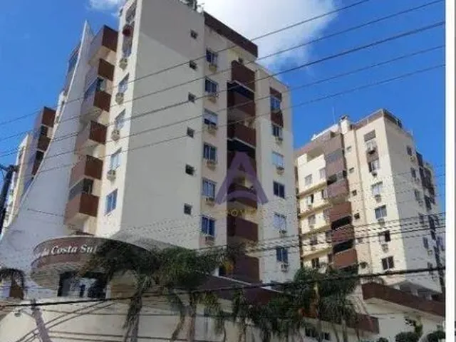 Imagem: O apartamento possui 2 Dormitórios, 1 Suíte, 2 Banheiros,